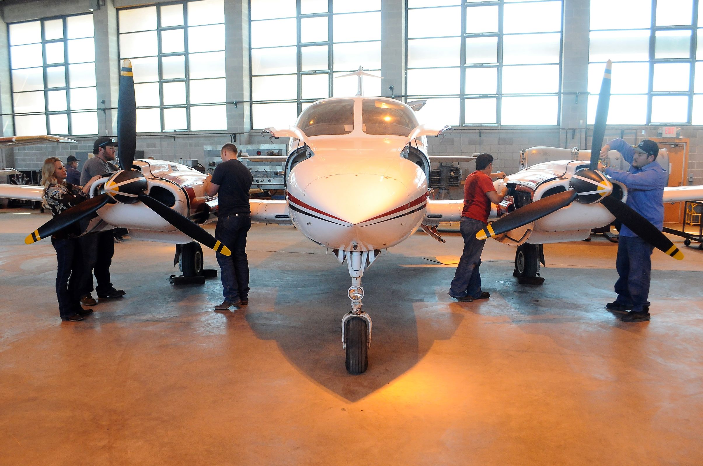 Technicians working on an aircraft at Roswell Air Center.