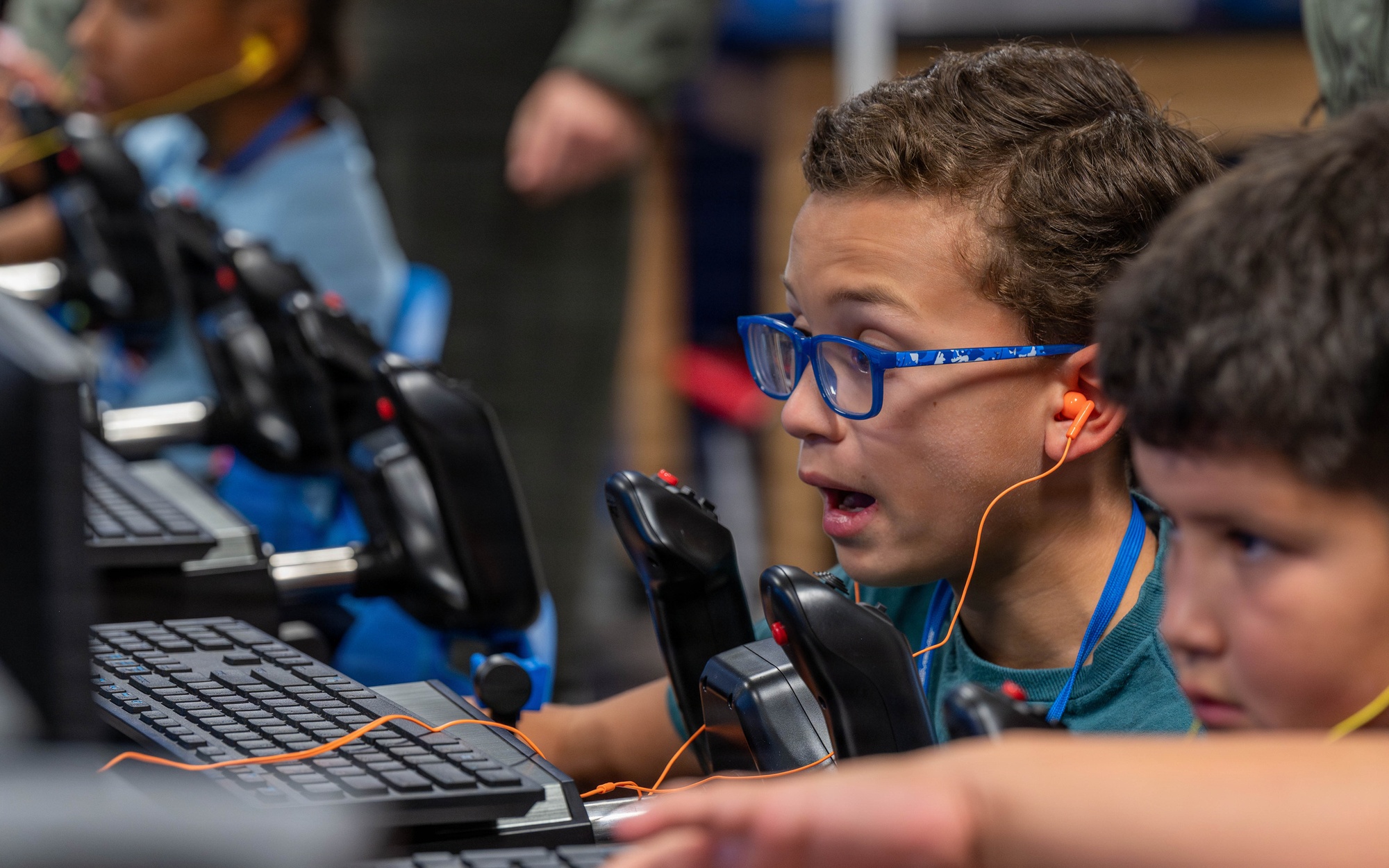 Student using a flight simulator at STARBASE Holloman in Otero County.