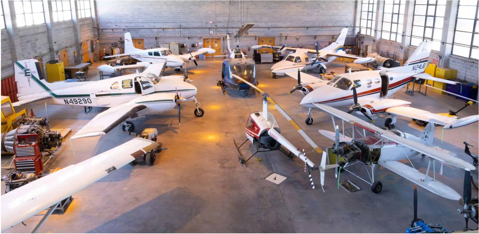 Aircraft under maintenance inside the ENMU-Roswell aviation hangar.
