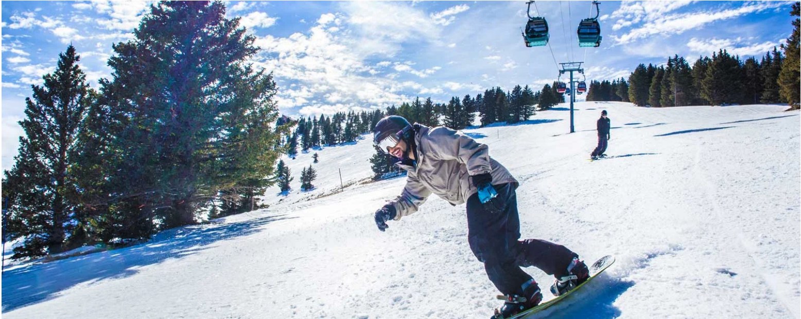 Snowboarder on the slopes at Ski Apache near Ruidoso, New Mexico.